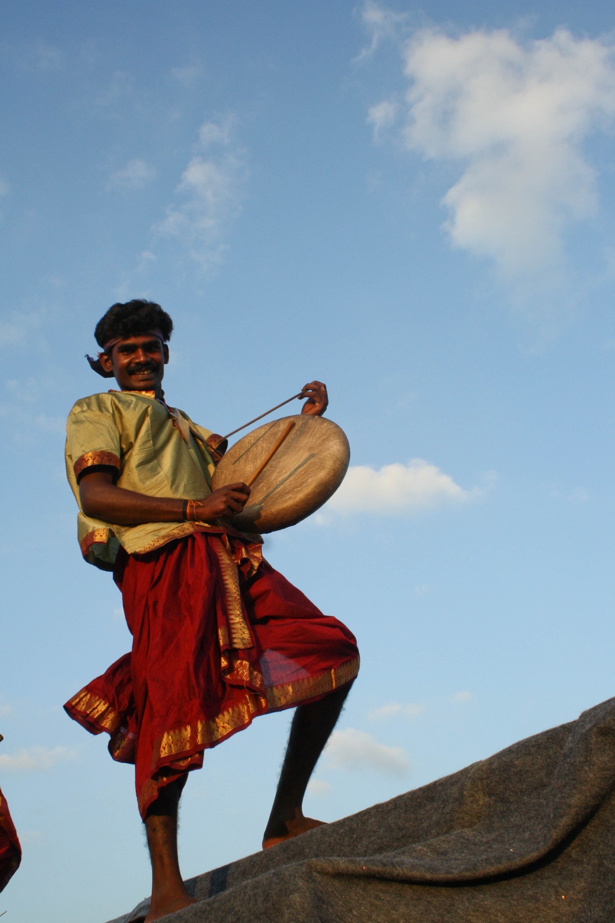 Parai drummer at golden hour, Tamil Nadu
